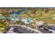 Community clubhouse with pool and parking at 13600 Egret Blvd # 204K, Clearwater, FL 33762