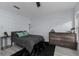 Cozy bedroom with a comfortable bed and large window at 14040 Cascade Ln, Tampa, FL 33618