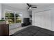 Spacious bedroom with a large window and plenty of closet space at 14040 Cascade Ln, Tampa, FL 33618