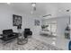 Spacious living room and dining area combo with modern furniture and decor at 14040 Cascade Ln, Tampa, FL 33618