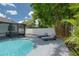 Comfortable loungers beside the pool, ideal for relaxation at 14040 Cascade Ln, Tampa, FL 33618