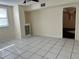 Bright living room featuring tile floors and a ceiling fan at 1509 Sw 7Th St, Ruskin, FL 33573