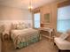 Inviting bedroom with coastal decor, stylish furnishings, and plenty of natural light at 17014 Clear Cork Dr, Wimauma, FL 33598