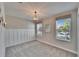 Bedroom view showing a modern chandelier and ample natural light at 17014 Clear Cork Dr, Wimauma, FL 33598