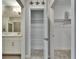 Hallway view showing bathroom, linen closet and bedroom closet at 17014 Clear Cork Dr, Wimauma, FL 33598