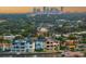 Aerial perspective showcasing the home's waterfront location and neighborhood at 2081 Michigan Ne Ave, St Petersburg, FL 33703