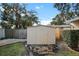 Tan storage shed with stone pathway at 2231 60Th N Way, St Petersburg, FL 33710