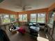 Bright sunroom with many windows at 225 174Th E Ave, Redington Shores, FL 33708