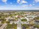 An aerial view of the community under a blue sky with scattered clouds at 2381 Ecuadorian Way # 33, Clearwater, FL 33763