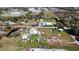 Aerial view of commercial property with large lot and outbuildings at 2601 11Th Se Ave, Ruskin, FL 33570