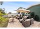 Patio furniture with fire pit and hammock at 263 42Nd Ne Ave, St Petersburg, FL 33703