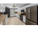Modern kitchen featuring ample counter space, stainless steel appliances, and two-tone cabinetry at 263 42Nd Ne Ave, St Petersburg, FL 33703