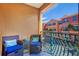 Private balcony with comfortable seating overlooks community at 2738 Via Tivoli # 220B, Clearwater, FL 33764