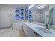 Elegant bathroom featuring double vanity and soaking tub at 2738 Via Tivoli # 220B, Clearwater, FL 33764