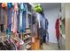 Large walk-in closet with ample shelving and hanging space at 2738 Via Tivoli # 220B, Clearwater, FL 33764