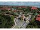 Grand entrance to community with gated access and landscaping at 2738 Via Tivoli # 220B, Clearwater, FL 33764
