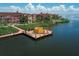 Community dock with seating area, offering waterfront access and relaxation at 2738 Via Tivoli # 220B, Clearwater, FL 33764