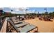 Relaxing community dock with lounge chairs and picnic tables at 2738 Via Tivoli # 220B, Clearwater, FL 33764