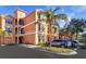 Building exterior highlighting a specific unit with attractive architectural details at 2738 Via Tivoli # 220B, Clearwater, FL 33764