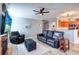 Open living area with hardwood floors, fireplace and kitchen views at 2738 Via Tivoli # 220B, Clearwater, FL 33764