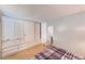 Spacious bedroom with ample closet space and wood floors at 27466 Us Highway 19 N # 78, Clearwater, FL 33761