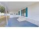 Covered porch with steps leading to the home entrance at 27466 Us Highway 19 N # 78, Clearwater, FL 33761