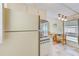 Efficient kitchen with white cabinets and appliances at 27466 Us Highway 19 N # 78, Clearwater, FL 33761