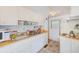 Small kitchen with white cabinets and wood countertops at 27466 Us Highway 19 N # 78, Clearwater, FL 33761