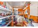 Shared laundry room with washer, dryer, and storage at 27466 Us Highway 19 N # 78, Clearwater, FL 33761