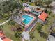 Community pool with surrounding lounge chairs and landscaping at 3245 Beneva Rd # 201, Sarasota, FL 34232