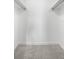 Large walk-in closet with carpeted floor at 3245 Beneva Rd # 201, Sarasota, FL 34232