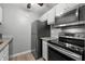 Modern kitchen with stainless steel appliances at 3245 Beneva Rd # 201, Sarasota, FL 34232