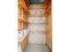 Additional storage with built-in wooden shelves at 3245 Beneva Rd # 201, Sarasota, FL 34232
