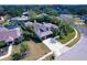 Spacious home boasts mature landscaping, a paved driveway, and an attached two-car garage at 335 Palmdale Dr, Oldsmar, FL 34677
