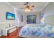 Inviting main bedroom with hardwood floors, pool views, and a coastal-inspired aesthetic at 335 Palmdale Dr, Oldsmar, FL 34677