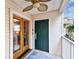 Inviting front entrance with double doors and a green door leading into the home at 3629 Gulf Blvd, St Pete Beach, FL 33706