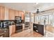 Modern kitchen with stainless steel appliances and island at 3629 Gulf Blvd, St Pete Beach, FL 33706