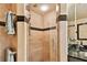 Clean shower with glass enclosure and tiled walls at 3629 Gulf Blvd, St Pete Beach, FL 33706