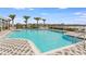 Refreshing community pool with ample seating at 3836 Turning Tides Ter, Bradenton, FL 34208
