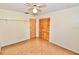 Bright bedroom with wood-look floors and double closets at 4409 Ann Arbor Dr, Tampa, FL 33610