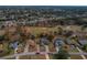Aerial view of a single Gathering home located in a neighborhood at 5052 Florentine Ct, Spring Hill, FL 34608