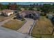 Aerial view of house, showing driveway and landscaping at 5052 Florentine Ct, Spring Hill, FL 34608