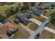 House with pool and paved driveway, aerial view at 5052 Florentine Ct, Spring Hill, FL 34608
