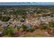Aerial view of a home with a private pool and a large backyard at 5052 Florentine Ct, Spring Hill, FL 34608