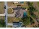 Aerial view of house with pool and large backyard at 5052 Florentine Ct, Spring Hill, FL 34608