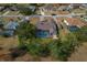Aerial view of house with pool and spacious yard at 5052 Florentine Ct, Spring Hill, FL 34608