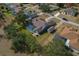 Aerial view of home with pool and fenced backyard at 5052 Florentine Ct, Spring Hill, FL 34608