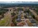 Aerial view of a single Gathering home with pool and fenced backyard at 5052 Florentine Ct, Spring Hill, FL 34608