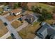 Aerial view of house with pool and landscaped yard at 5052 Florentine Ct, Spring Hill, FL 34608