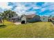 Backyard oasis with a pool, patio, and grilling area at 5052 Florentine Ct, Spring Hill, FL 34608